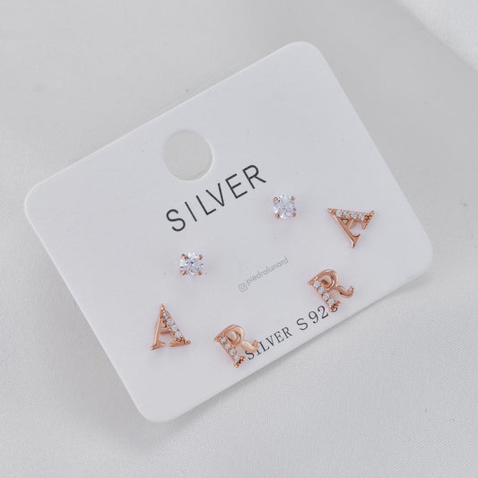 Set aretes baño de oro  x 3 letras A R y circonitas S3-29