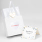 Empaque luxury mediano Blanco + Caja Rigida + Funda + Tarjeta Dedicatoria EM18