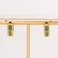 Aretes en baño de oro tipo argolla multi esmeralda A111