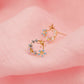 Aretes baño de oro circular con flores y circonitas A19